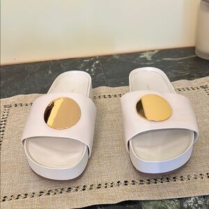 Tory Burch White and Gold Mules
wore once
Open to reasonable offer